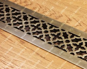 Алюминиевая решетка в подоконник с обработкой под состаренную латунь